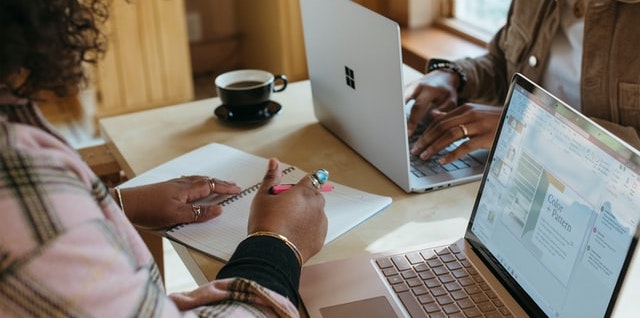 People co-working with a coffee